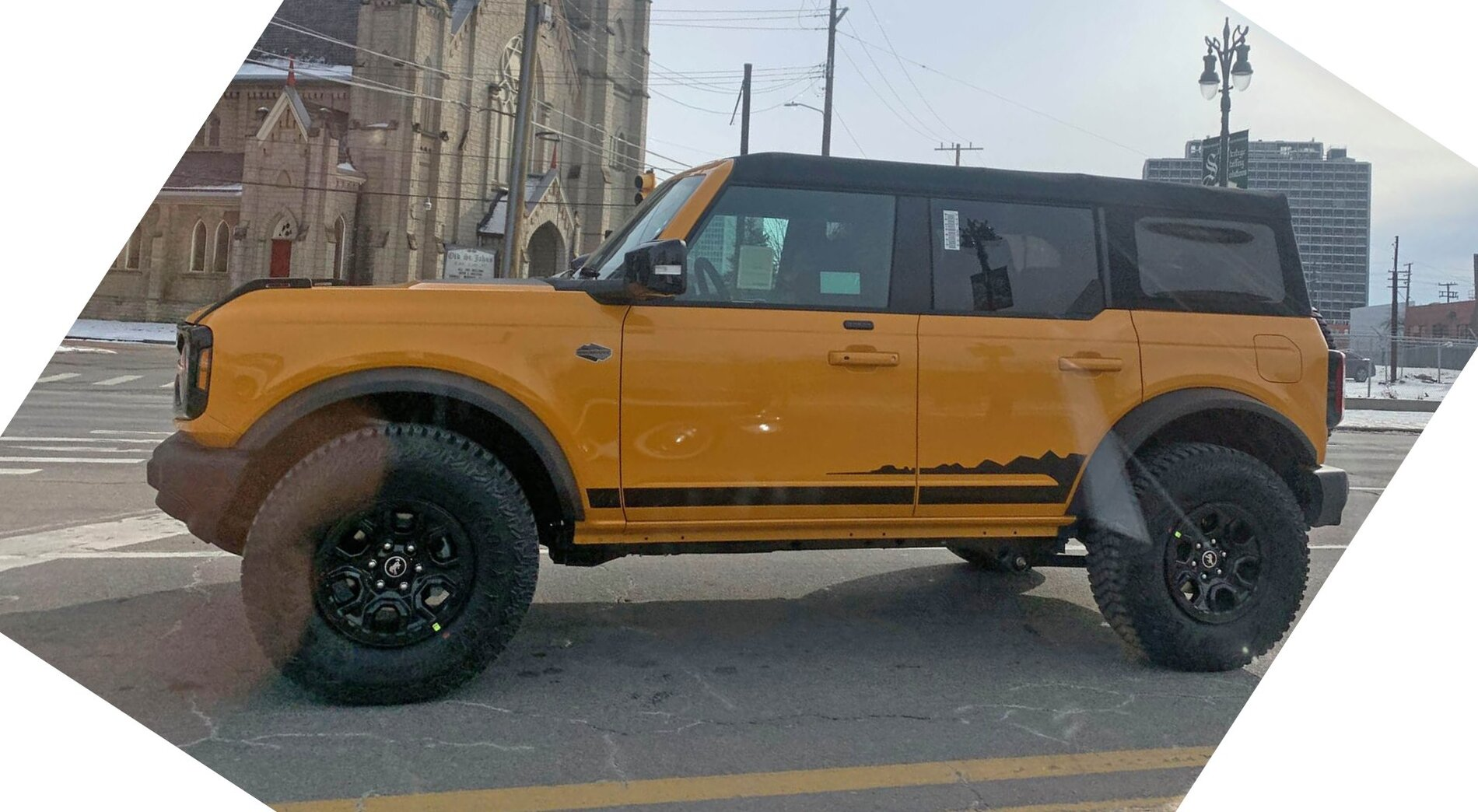 Ford Bronco WILDTRAK (Cyber Orange 4-Door) out and about in Detroit 1612109810395