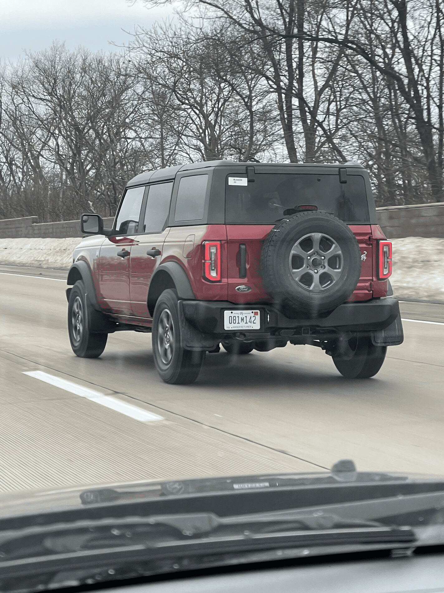 Ford Bronco Race Red WildTrak + Rapid Red Big Bend spotted driving in Michigan 1614196318910