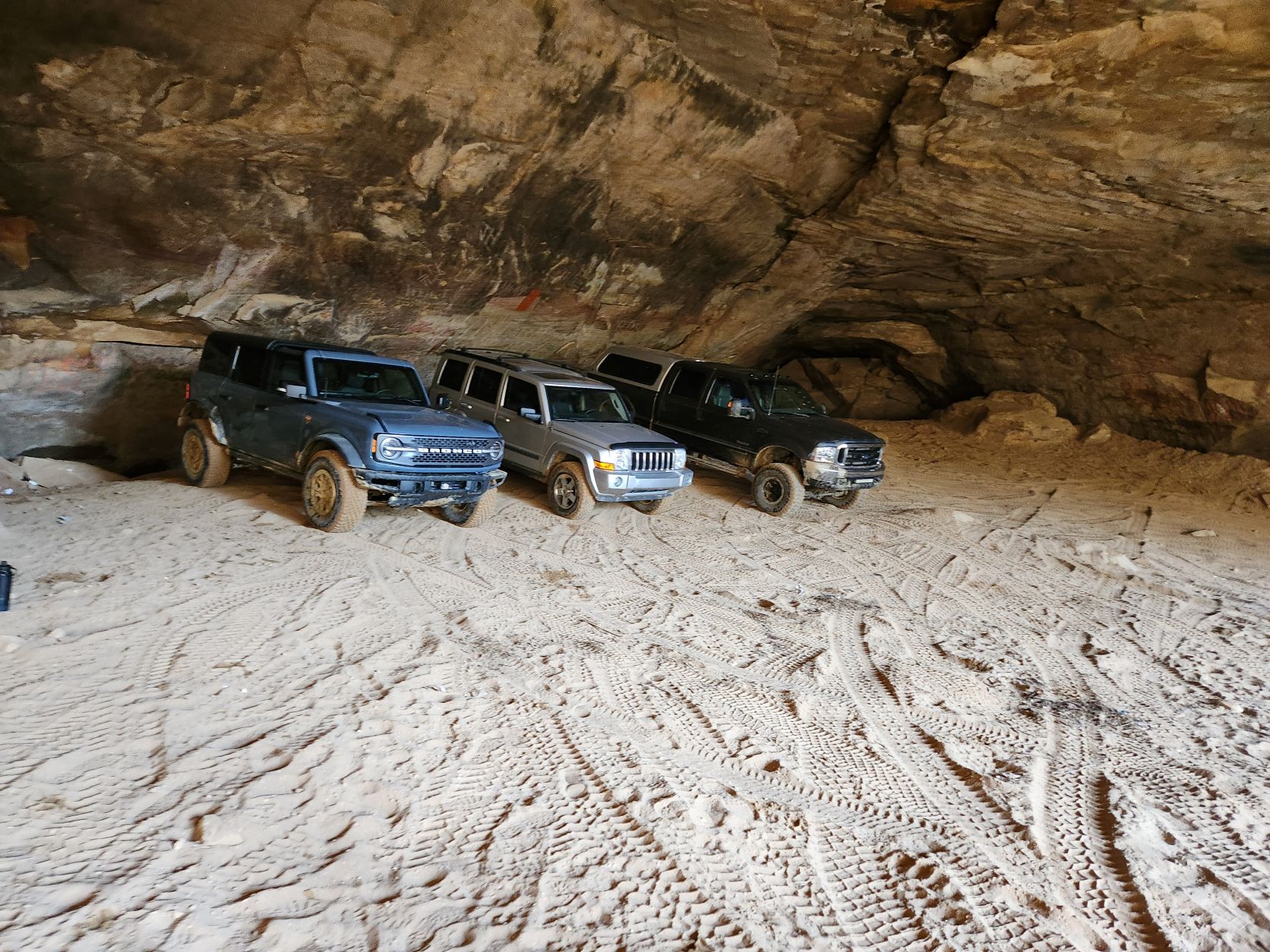 Ford Bronco 2023 Azure Gray Metallic WOLL Badlands Build 3 in a cave