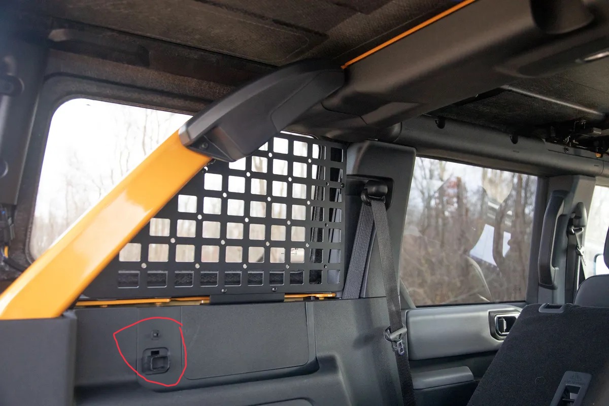 Ford Bronco What is that plug looking thing on the inside drivers rear panel? 3FF43880-C79D-4F48-89E8-F0D77638D3FE