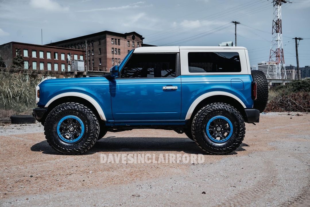 Ford Bronco A Velocity Blue Bronco Goes Retro With White Roof + White Fender Flares blue fender and white bumper