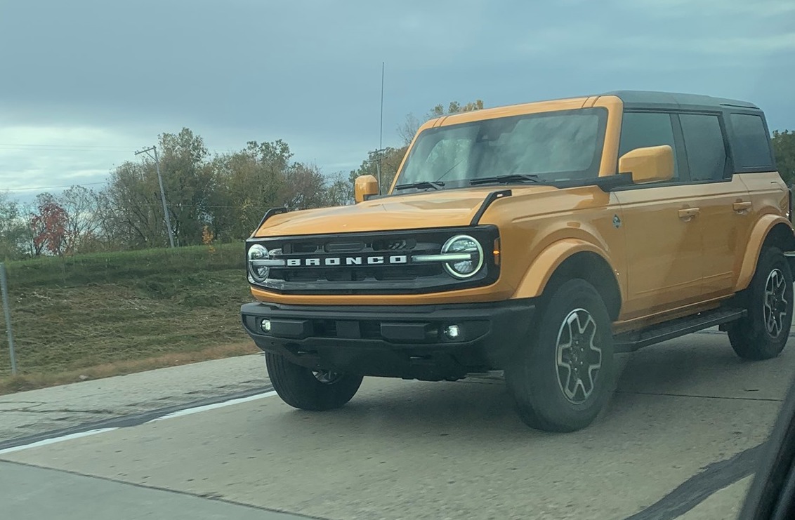 Cyber Orange Outer Banks 2021 Bronco on the road in real life 1.jpg