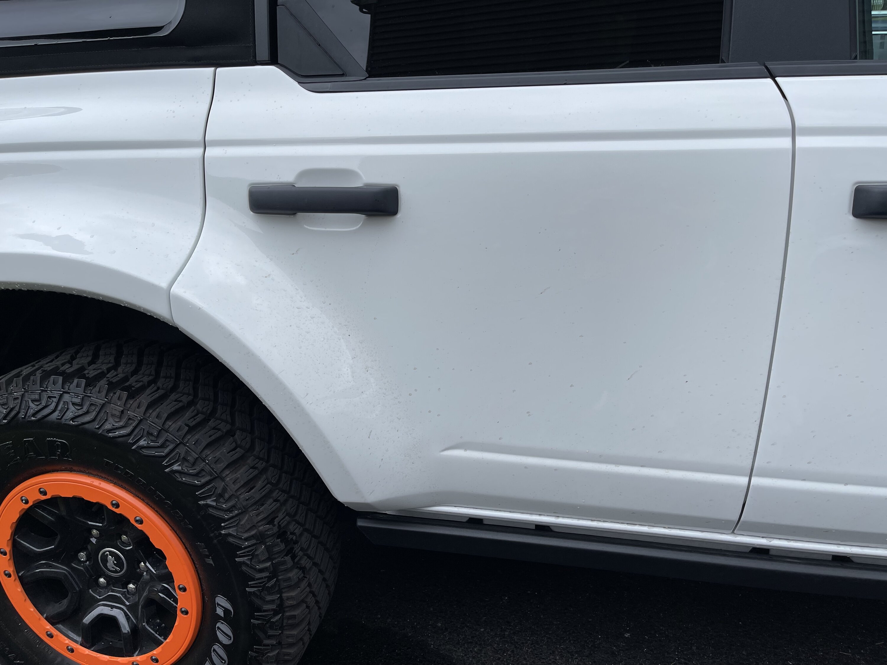 Ford Bronco ADV Fenders + Ram Air Hood Install on White Bronco door