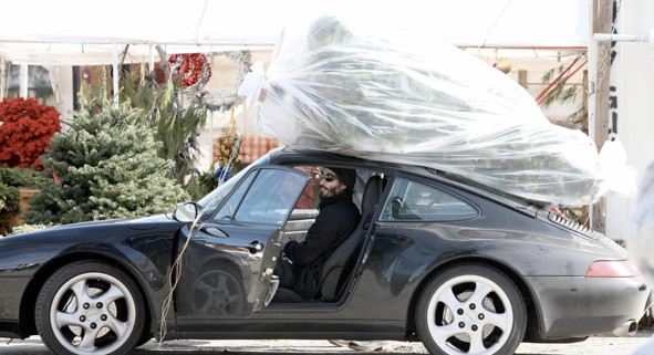 Ford Bronco Christmas tree transporting without roof rack? keanu-reeves-straps-christmas-tree-to-his-porsche-29092_1