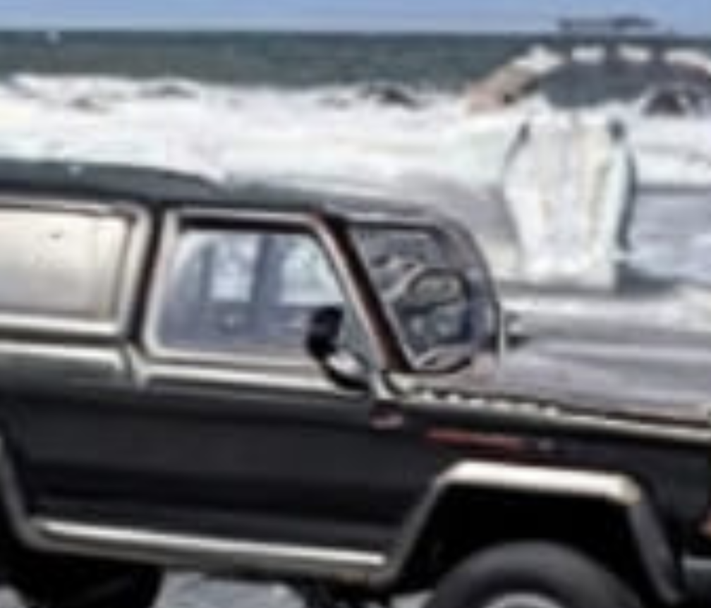 Ford Bronco LOL … totaled Cybertruck on the beach image1_0