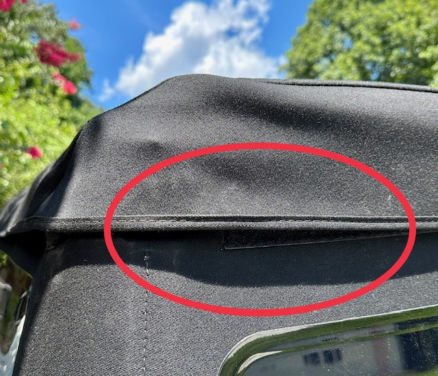 Ford Bronco Soft top issue - ripped plastic component at driver rear top corner. Top 1