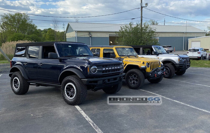 Wild Broncos surround and dwarf a Jeep Wrangler Rubicon! (4-Door Broncos vs 4-Door Wrangler Rubicon)